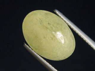 Danburit 6,02 Ct. gelb Oval Cabochon Tansania