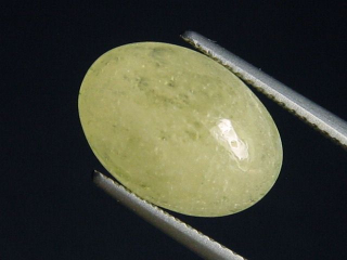 Preview: Danburit 6,02 Ct. gelb Oval Cabochon Tansania