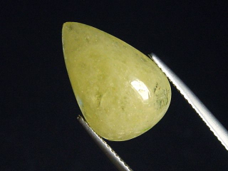 Danburit 10,69 Ct. gelb Tropfen Cabochon Tansania