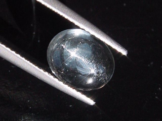 Goshenite Beryl cat's eye 2,96 Ct. cabochon Brazil