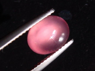Preview: Rhodochrosit Katzenauge 2,00 Ct. Oval Cabochon - Kuruman, Südafrika