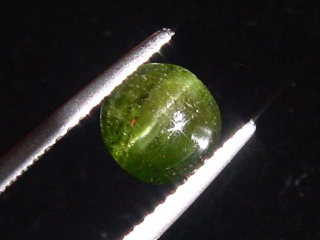 Kornerupin Katzenauge 1,34 Ct. Rund Cabochon Sri Lanka