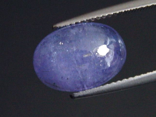 Tansanit 7,18 Ct. violett 13 x 9 mm Oval Cabochon