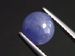 Tansanit 1,95 Ct. violett 7 mm Rund Cabochon