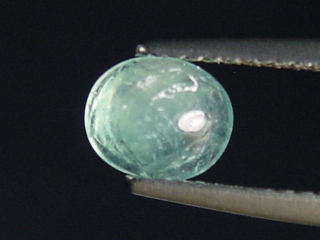 Preview: Grandidierit 0,77 Ct. selten Oval Cabochon Andrahomana, Madag. B-Qualität
