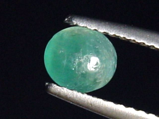 Grandidierit 0,74 Ct. selten Oval Cabochon Andrahomana, Madag.