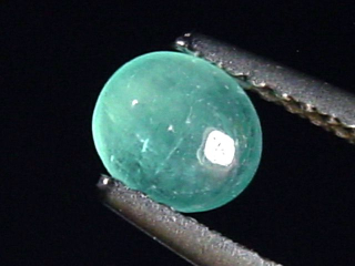 Grandidierit 0,42 Ct. selten Oval Cabochon Andrahomana, Madag.