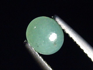 Grandidierit 0,55 Ct. selten Oval Cabochon Andrahomana, Madag.