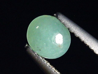Preview: Grandidierit 0,55 Ct. selten Oval Cabochon Andrahomana, Madag.