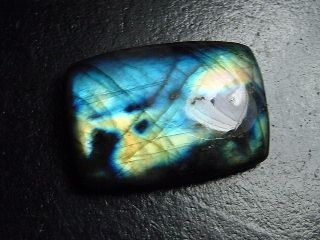 Labradorite 66,96 Ct. cushion cabochon Australia