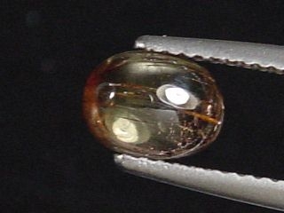 Andalusite 1,25 Ct. oval cabochon - Minas Gerais, Brazil