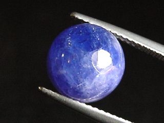 Tanzanite 6,93 Ct. - violet - 10 mm round cabochon