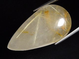 Rutile Quartz 47,92 Ct. fine golden needles pear cabochon