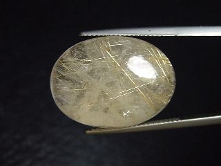 Rutile Quartz 29,23 Ct. golden Rutile needles oval cabochon