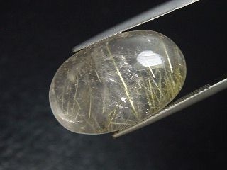 Rutile Quartz 21,58 Ct. golden Rutile needles oval cabochon