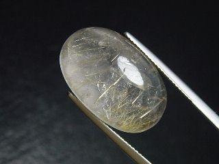 Rutilquarz 21,58 Ct. goldene Rutileinschlüsse Oval Cabochon