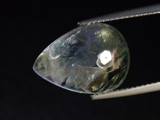 Zoisite / Tanzanite 11,20 Ct. bicolor unheated cabochon