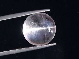 Skapolite cat's eye 10,22 Ct. colorless round cabochon Tanzania