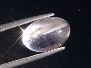 Skapolite cat's eye 5,94 Ct. colorless oval cabochon Tanzania