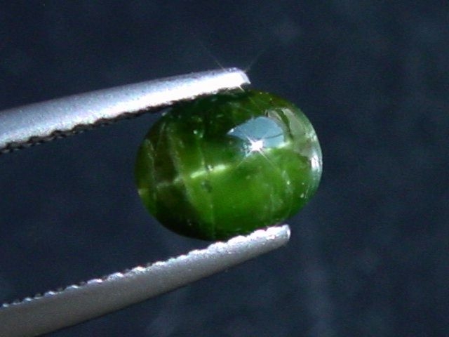Kornerupine cat's eye 1,28 Ct. oval cabochon Sri Lanka