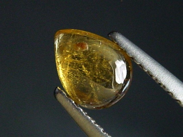 Dravite Tourmaline 0,77 Ct. pear cabochon Brazil
