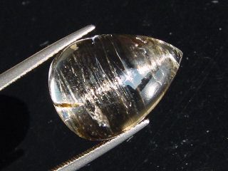 Skapolite cat's eye 15,78 Ct. brown pear cabochon Tanzania