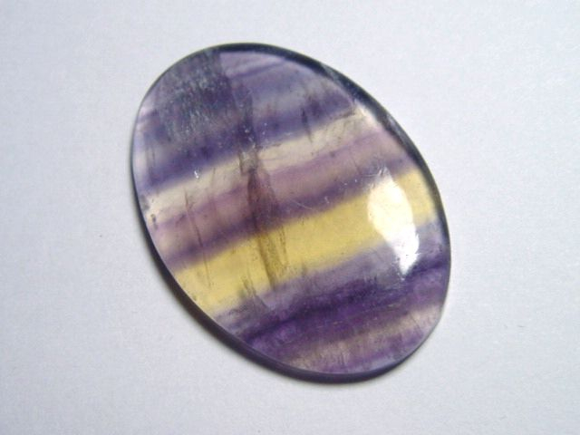 Fluorite 36,09 Ct. multicolor banded cabochon