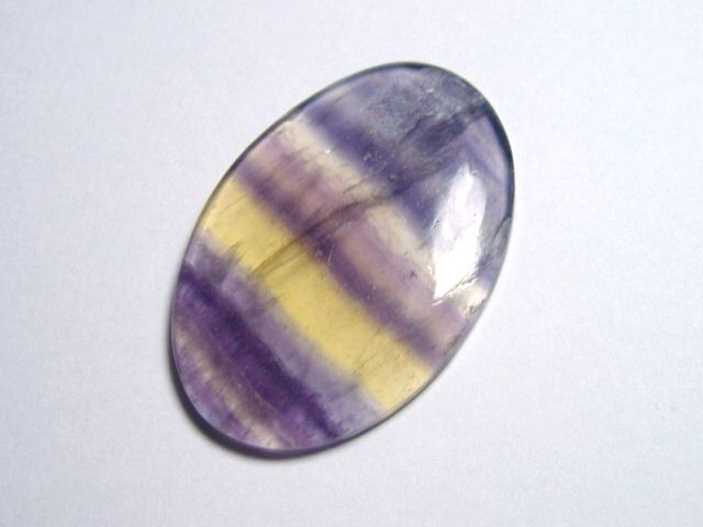 Fluorite 36,09 Ct. multicolor banded cabochon
