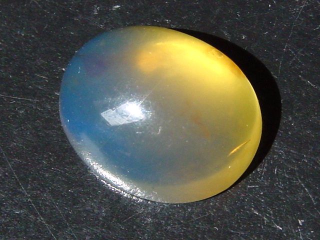 Blauer Bernstein 11,52 Ct. - 21,5 mm Oval Cabochon Dom. Rep.