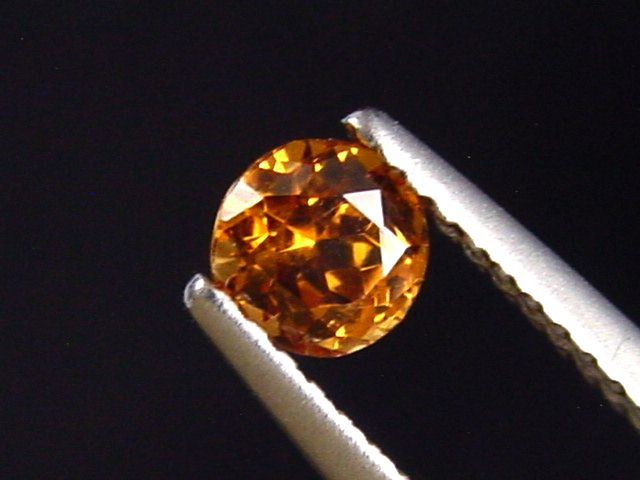 Spessartite Garnet 0,47 Ct. fine orange round Tanzania