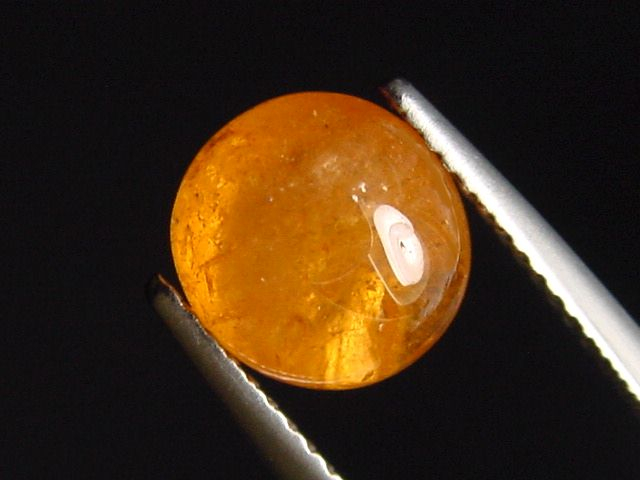 Spessartite Garnet 4,29 Ct. oval cabochon