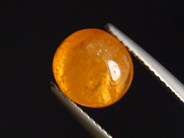 Spessartite Garnet 4,29 Ct. oval cabochon