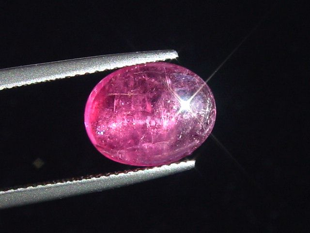 Rubellite Tourmaline cat's eye 3,56 Ct. oval cabochon Brazil