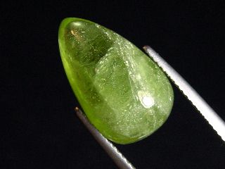Peridot 12,47 Ct. applegreen - 18 x 10,5 mm pear cabochon