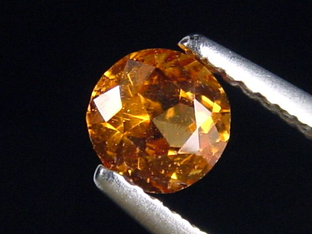 Spessartit Granat 0,71 Ct. leuchtend orange 5 mm Rund Tansania