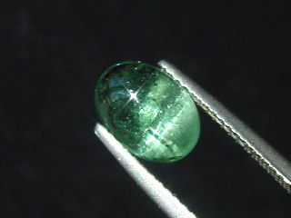 Indigolite Tourmaline cat's eye 2,07 Ct. oval cabochon Brazil