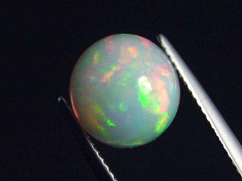 Opal 3,42 Ct. finest quality - round cabochon