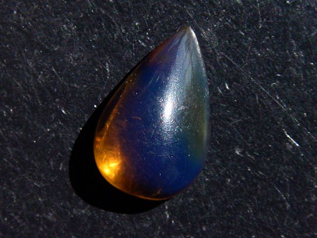 Blue Amber 4,72 Ct. - 19,5 mm cabochon