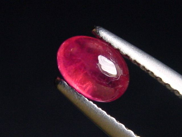 Pezzottaite 0,73 Ct. oval cabochon - rare Madagascar