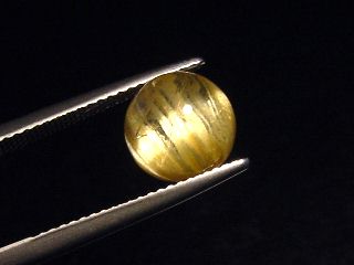 Rutile Quartz cat's eye 4,19 Ct. round cabochon - Minas Gerais, Brazil