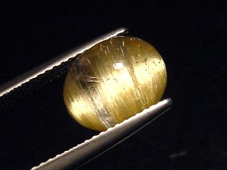 Rutile Quartz cat's eye 4,15 Ct. oval cabochon - Minas Gerais, Brazil