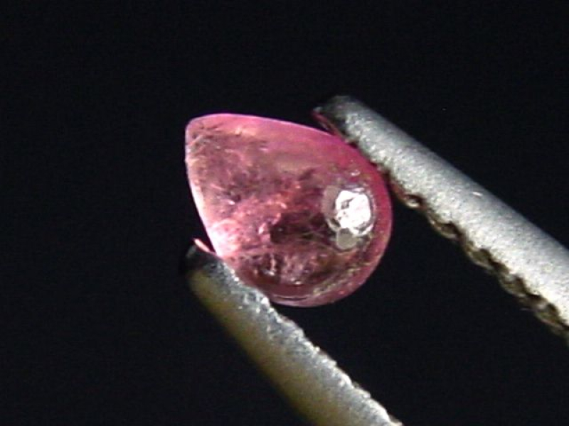 Pezzottaite 0,18 Ct. cabochon - rare Madagascar