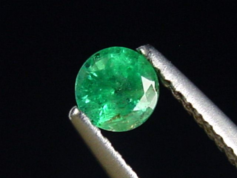 Emerald 0,32 Ct. fine green round Colombia