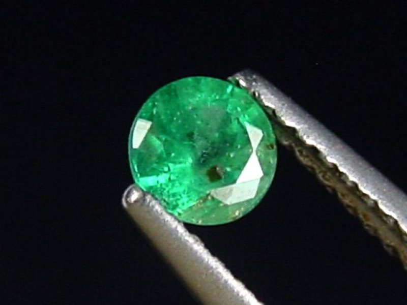 Emerald 0,32 Ct. fine green round Colombia