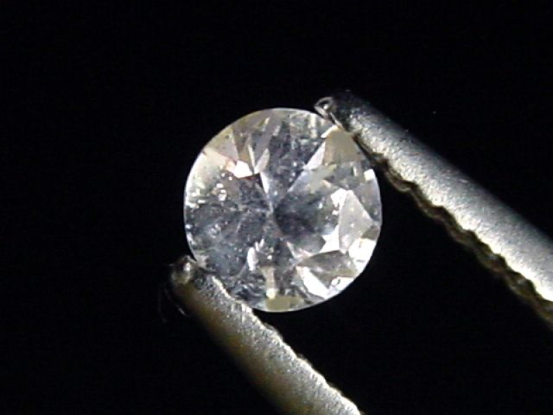 Sapphire colorless 0,35 Ct. natural color round cut Tanzania