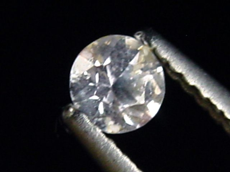 Sapphire colorless 0,35 Ct. natural color round cut Tanzania