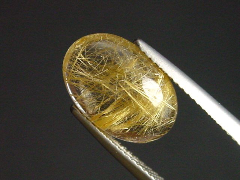 Rutilquarz 4,09 Ct. fein 14 x 9 mm Oval Cabochon