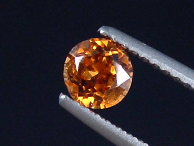 Spessartite Garnet 0,56 Ct. fine orange round Tanzania