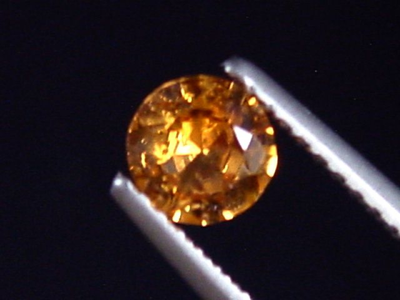 Spessartit Granat 0,53 Ct. leuchtend orange 5 mm Rund Tansania