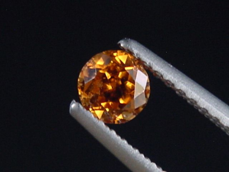 Spessartit Granat 0,39 Ct. leuchtend orange 4 mm Rund Tansania